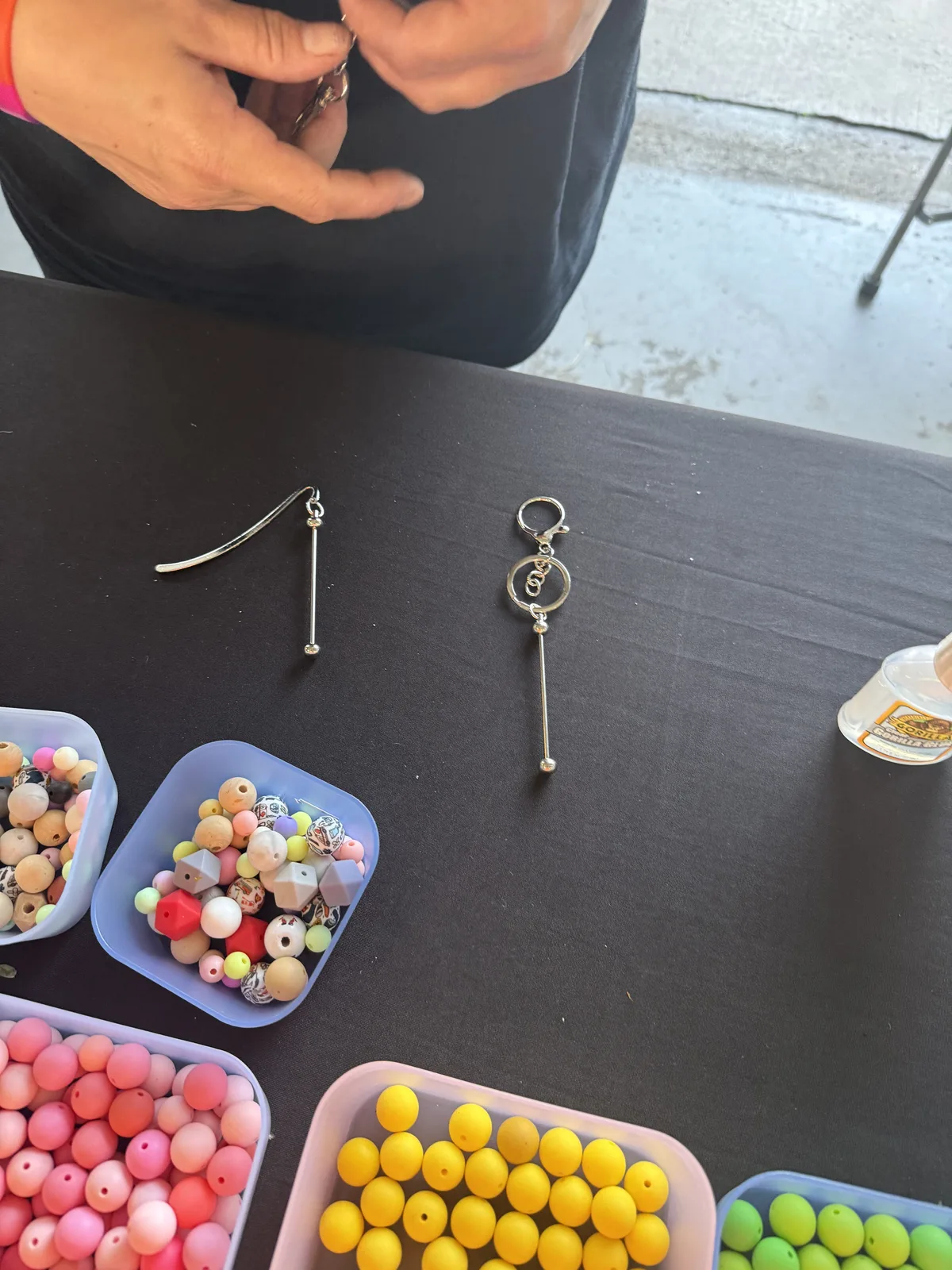 Blank bookmark and keychain bases beside colorful beads