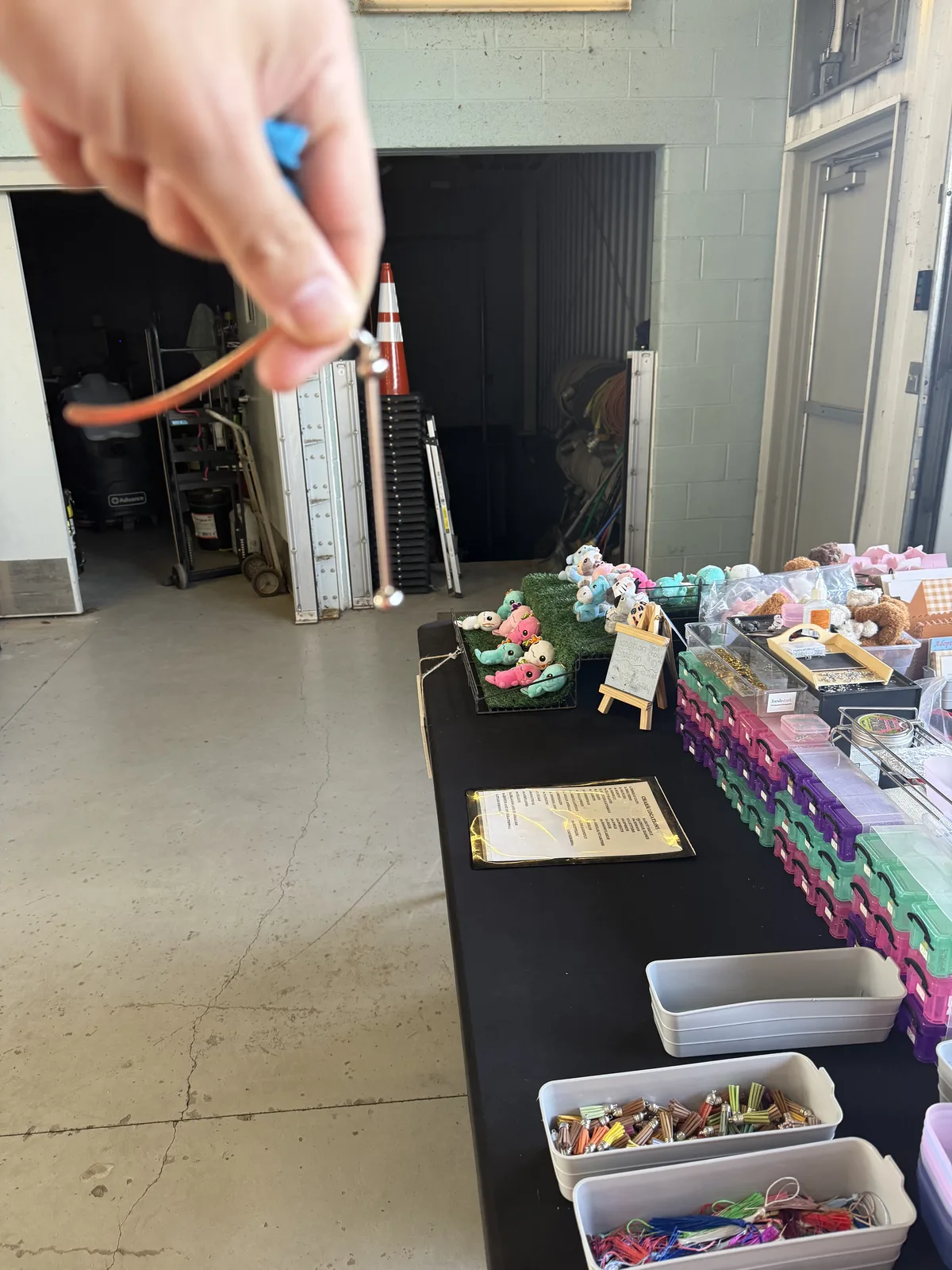 A completed handmade charm creation at the booth